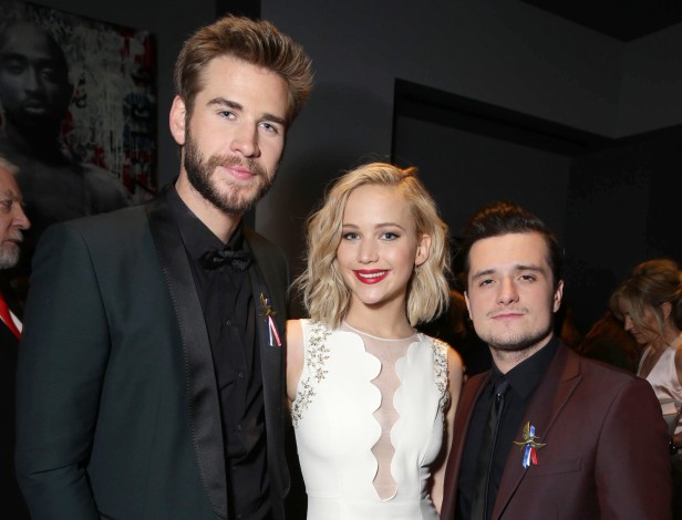 Liam Hemsworth, Jennifer Lawrence y Josh Hutcherson en la premier de The Hunger Games.